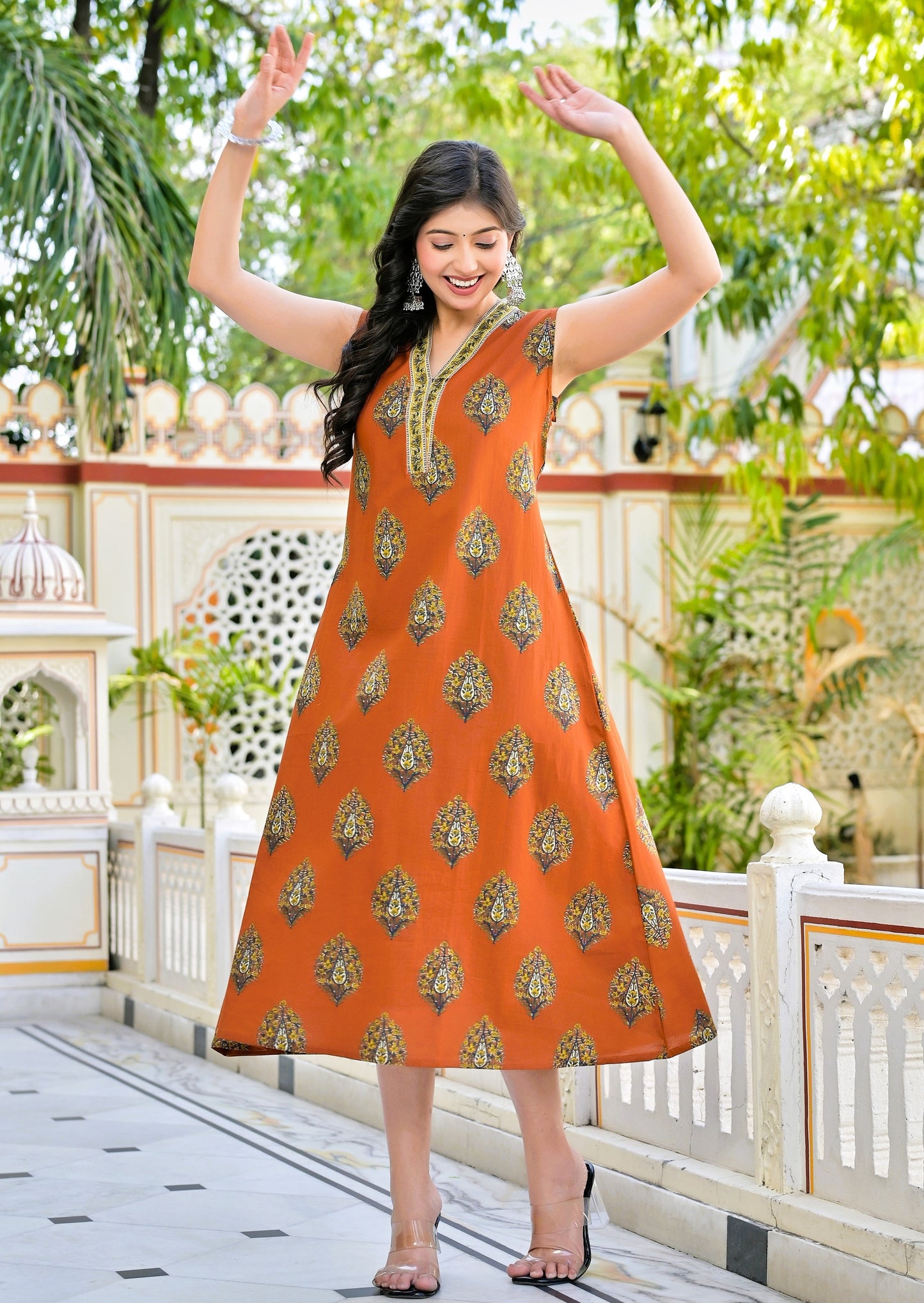 Orange Floral Sleeveless Kurti with Pocket