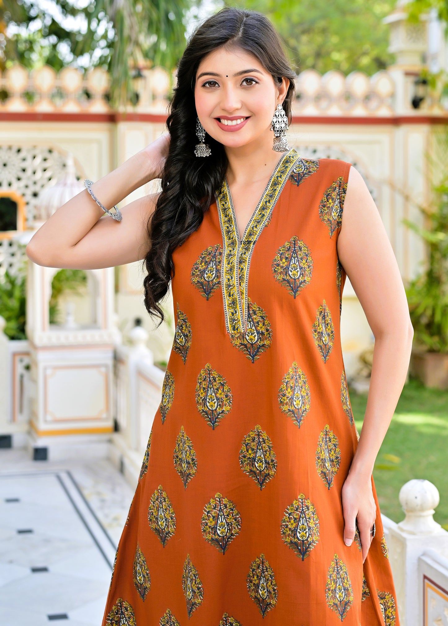 Orange Floral Sleeveless Kurti with Pocket